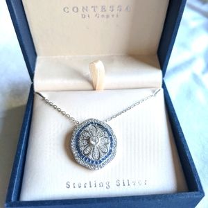 Silver necklace with blue and white crystal charm